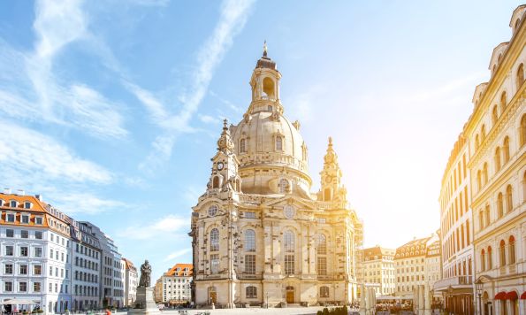 The baroque central building of the Frauenkirche Dresden is located at the Neumarkt.